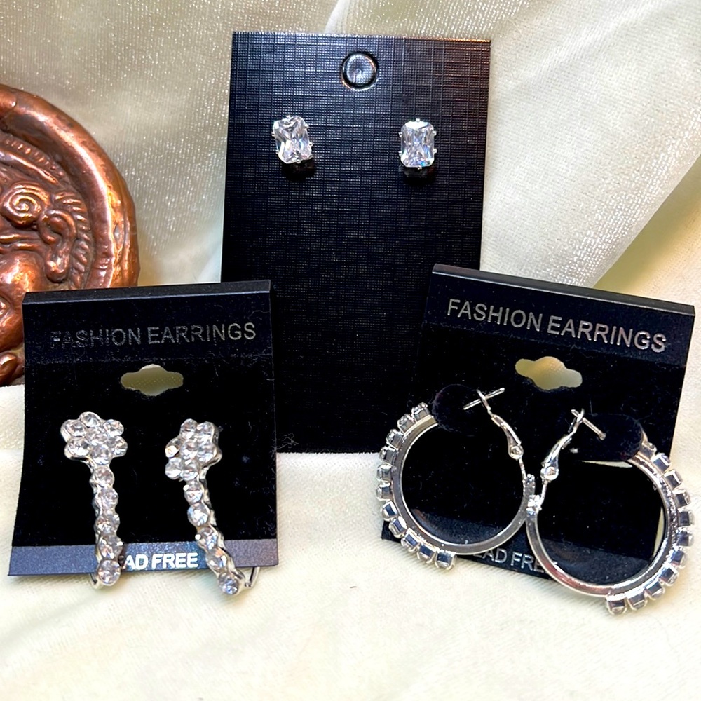 Rhinestone crystal and silvertone earrings set of three earrings